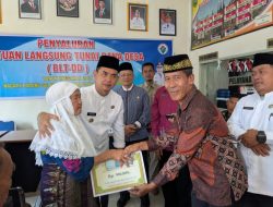 Serahkan BLT Dana Desa, Wabup Parulian : Manfaatkan Dengan Bijak